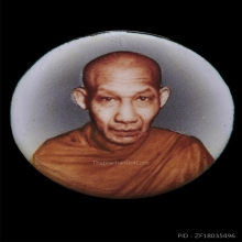 ล็อกเก็ตหลวงพ่อเกษม ปี2534 หลังแผ่นเงินหน้ากากทองคำ