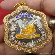 เหรียญเสมาแปดรอบเนื้อนวะหน้าเงินลงยาสามสี
