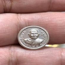 เหรียญขวัญถุง หลวงปูคำแสน เนื้อเงิน ปี 2520